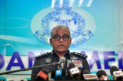two-malaysians,-suspected-of-involvement-with-trojan-spymax-ring,-sent-to-singapore-to-face-fraud-charges