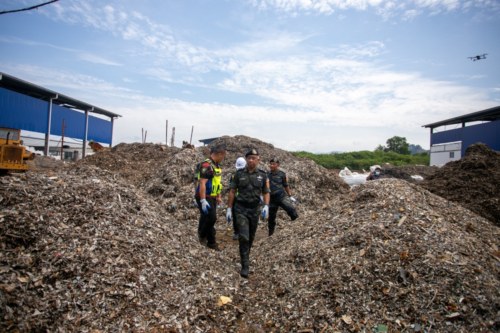 e-waste-crackdown:-rm1.3b-worth-of-machinery,-e-waste-seized;-27-arrested-in-perak-raid